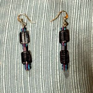 Handmade earrings. Made by my 10 year old son 🙂